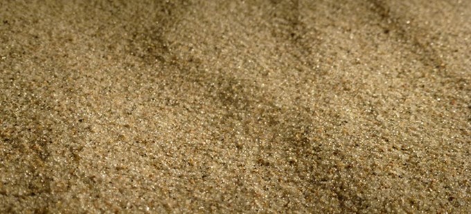 Sandkornets historie